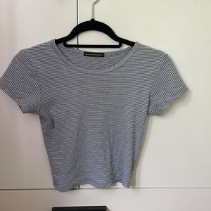 Brandy Melville blue and white striped top. Great condition, small stain spot.